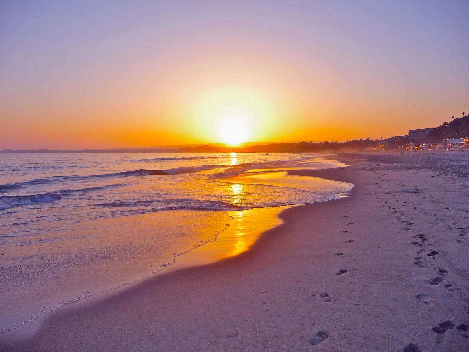 a beach at sunset